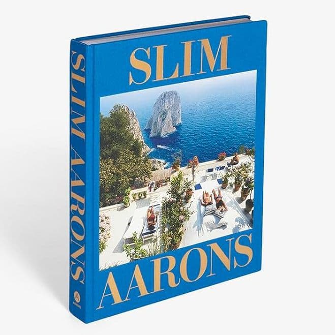 Blue book titled 'Slim Aarons' with a scenic cover