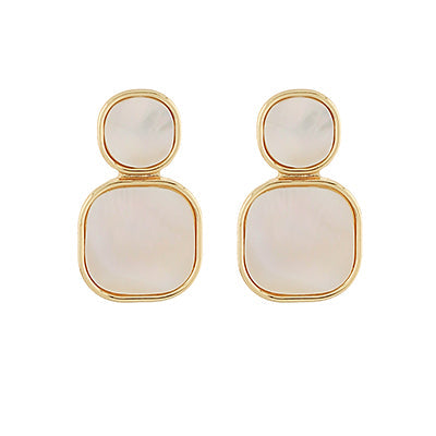 gold-framed earrings featuring two stacked pearlescent stones, one round and one square, displayed on a white background