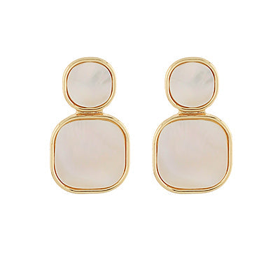 gold-framed earrings featuring two stacked pearlescent stones, one round and one square, displayed on a white background