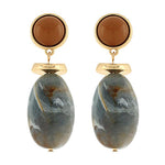 gold and stone oval drop earrings with marbled gray-blue stones and round brown studs displayed on a white background.