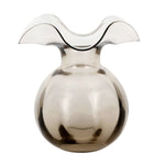 gray vase with wavy top on a white background