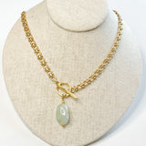front toggle gold chain necklace with 1" light blue//green stone