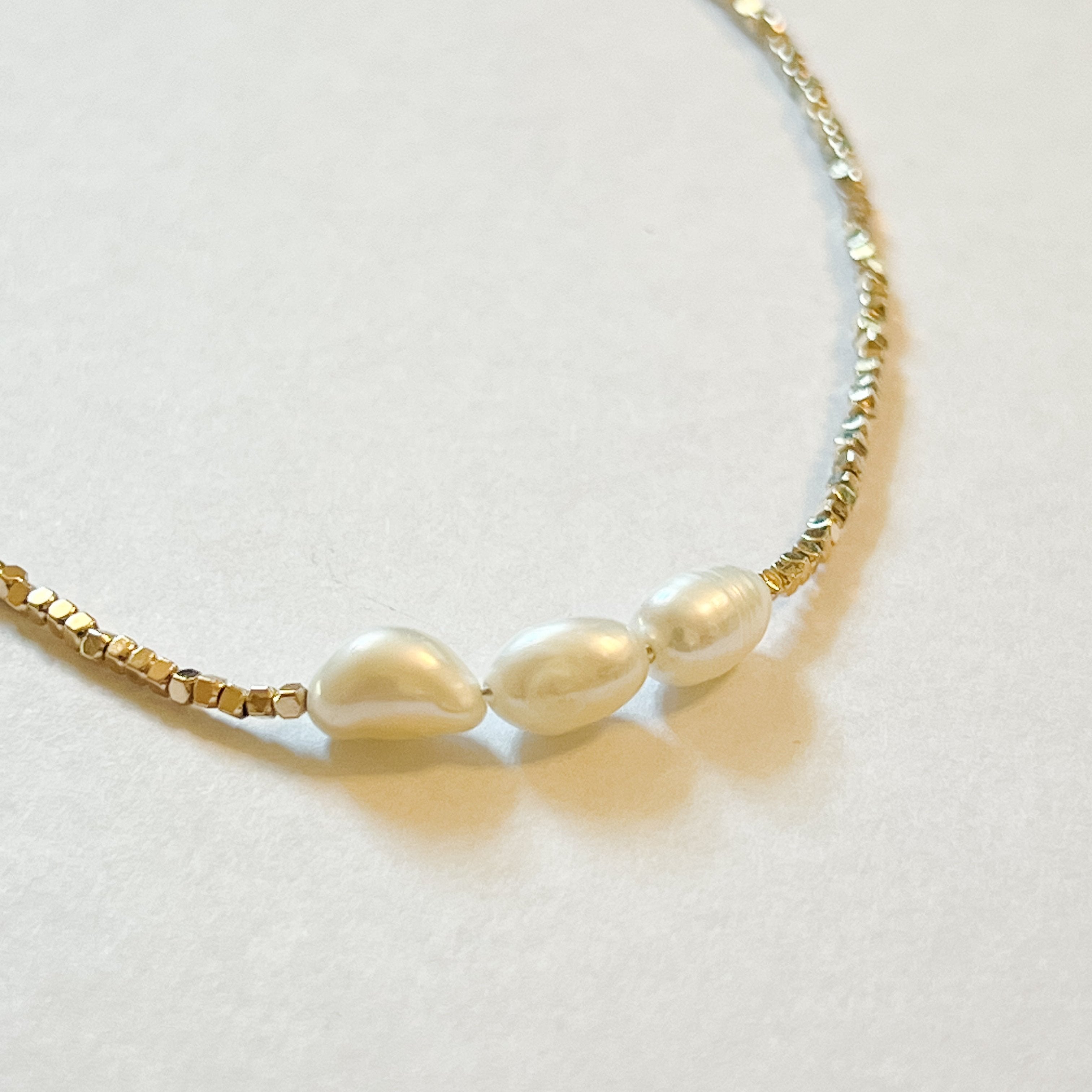 dainty gold choker with three pearls