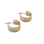 A pair of minimalist wide band gold hoop earrings with a polished finish, displayed on a white background.