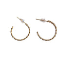 A pair of delicate twisted gold hoop earrings with a fine rope design, displayed on a white background.