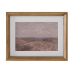 Framed landscape painting with a brown frame on a white background