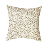 Decorative pillow with leaf pattern on a white background