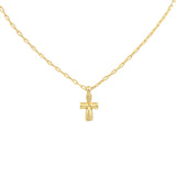 Gold necklace with a small cross pendant on a light gray background