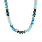 Necklace with blue and gold beads on a white background