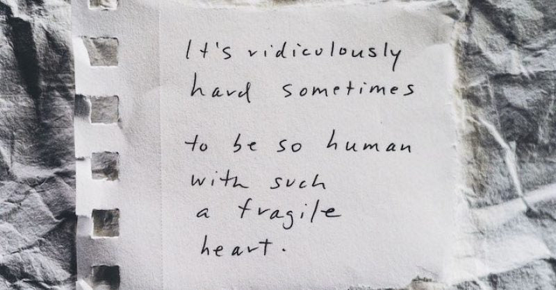 Text on a film strip background reading 'It's ridiculously hard sometimes to be so human with such a fragile heart.'