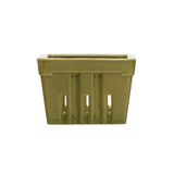 green rectangular berry basket with decorative cutouts on a white background