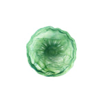 Green glass bowl on a white background