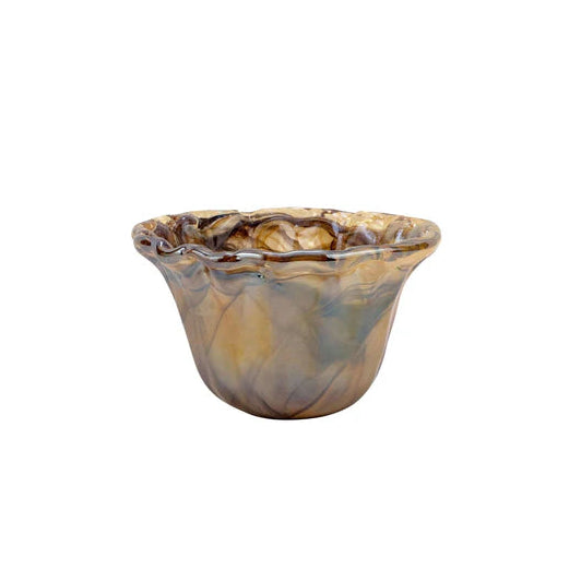 Glass bowl with marbled pattern on a white background