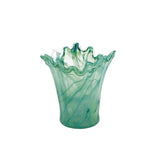 Green onda glass vase with wavy design on a white background