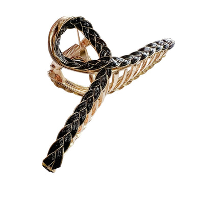 black leather and gold twisted hair clip