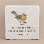 Decorative stone with engraved text from Psalm 16:8 and a yellow bird on a beige background