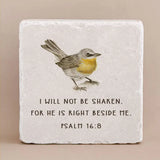 Decorative stone with engraved text from Psalm 16:8 and a yellow bird on a beige background