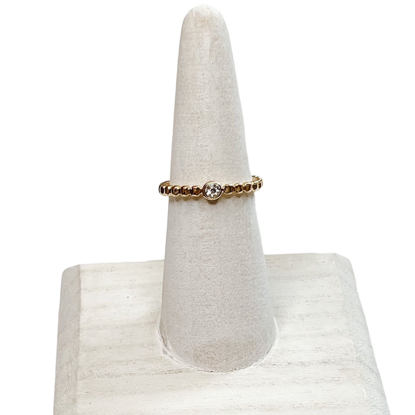 SIZE 7 RING WITH BEADED GOLD DESIGN AND SINGLE STONE