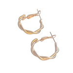 A pair of gold-tone hoop earrings with an interwoven twisted design and hinged clasp closures