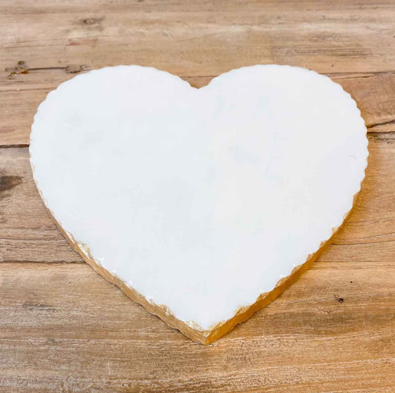 heart shaped white marble cutting/serving board with gold foil edge