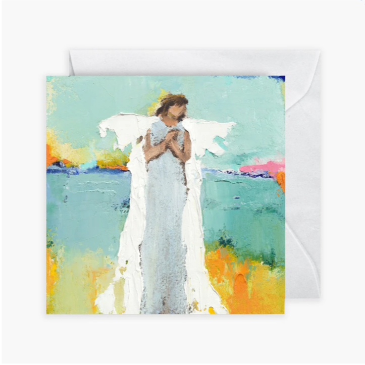 Greeting card with an angel holding a baby against a colorful landscape
