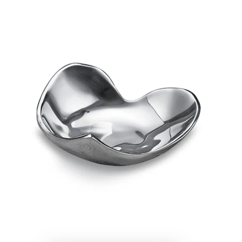 Silver bowl with wavy design on a white background