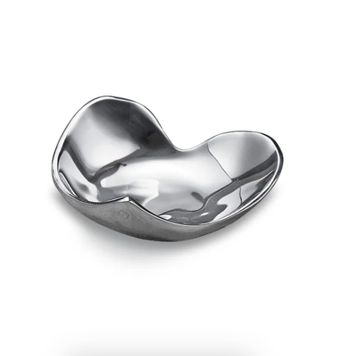 Silver bowl with wavy design on a white background