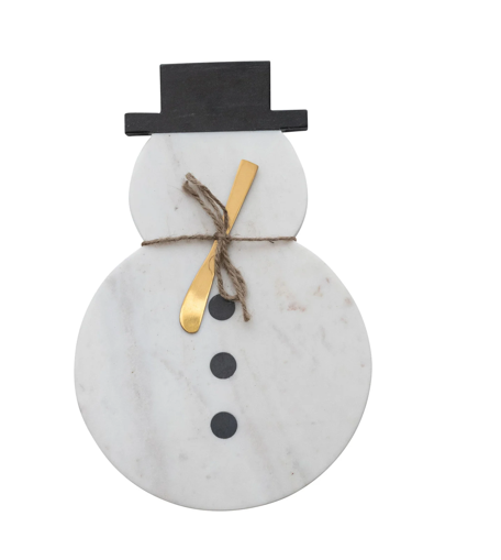 Marble snowman decoration with a black top hat, gold carrot nose, and black buttons on a white background.