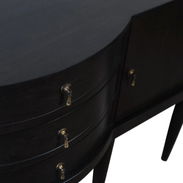 Black dresser with gold handles on a white background