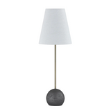 Table lamp with a dark base and white shade on a white background