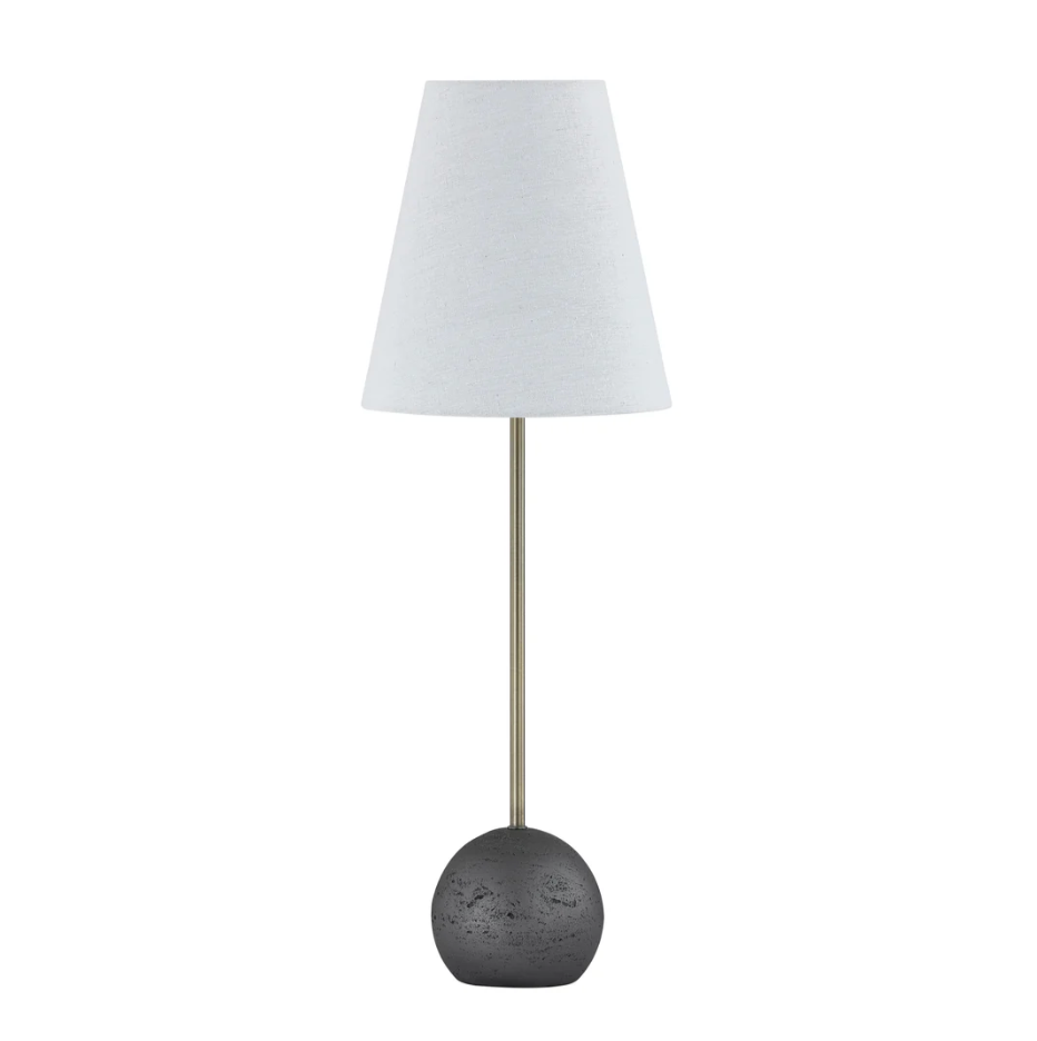 Table lamp with a dark base and white shade on a white background