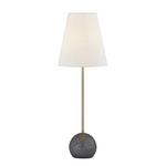 Table lamp with a dark base and white shade on a white background