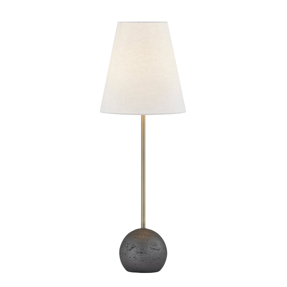 Table lamp with a dark base and white shade on a white background