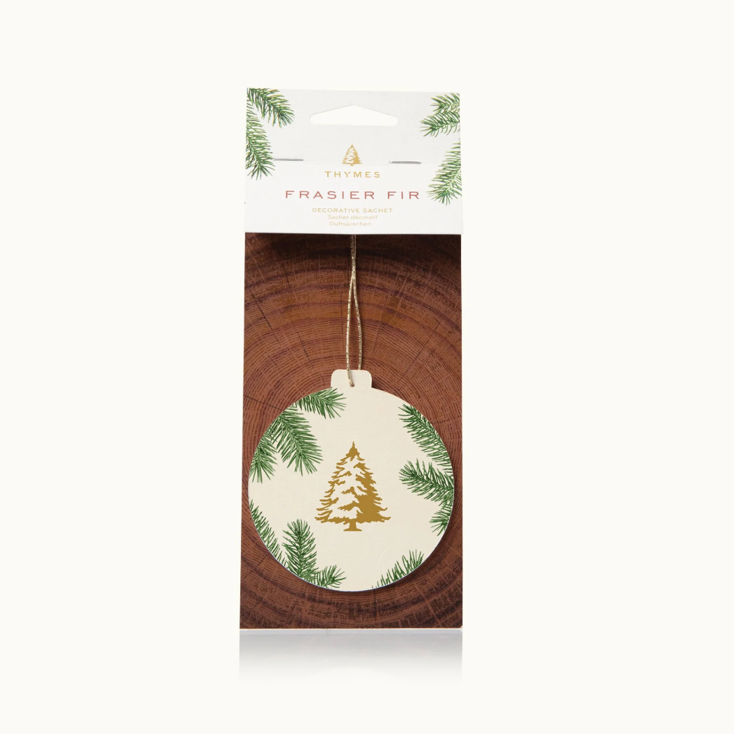 Christmas ornament packaging with a tree design on a white background