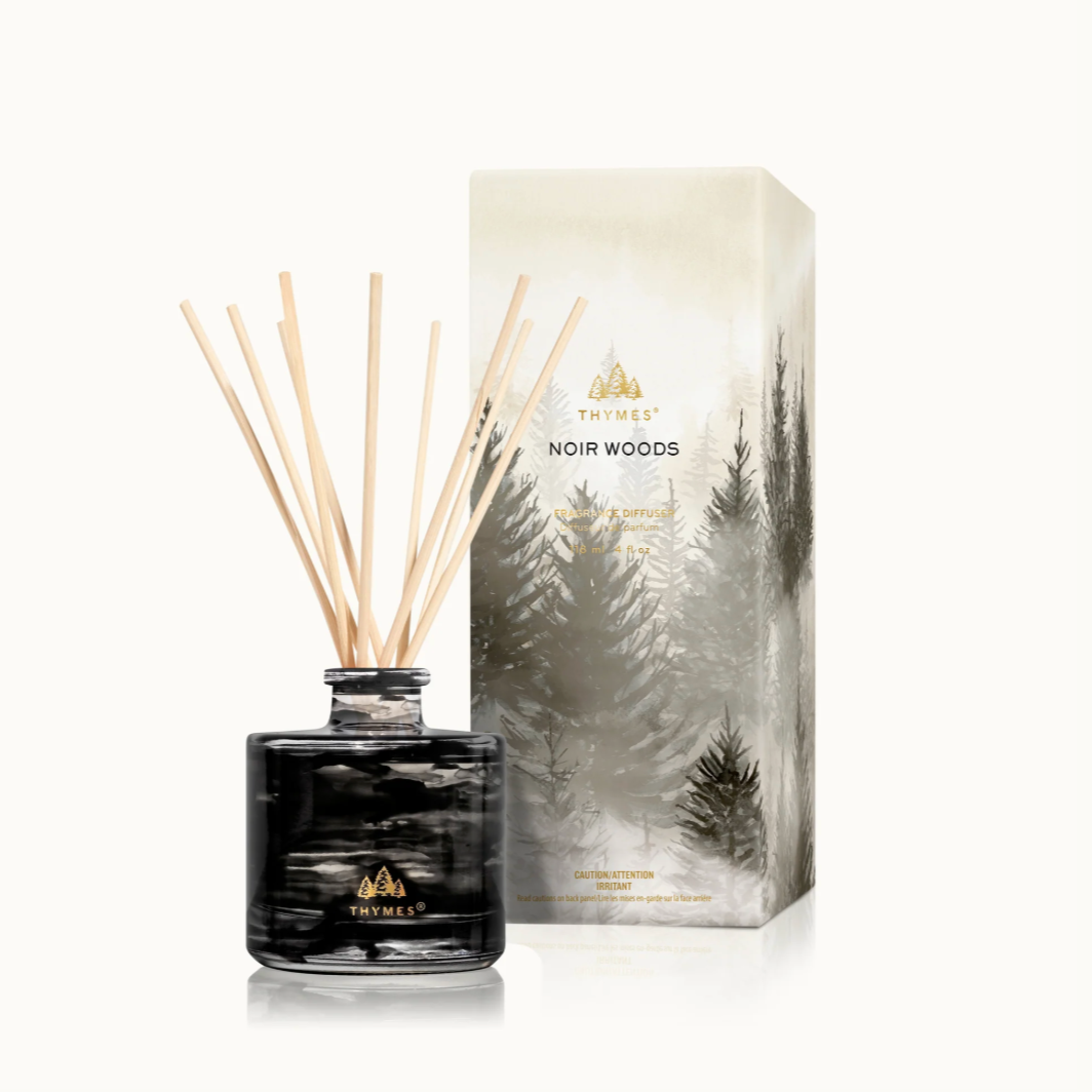 Thymes Noir Woods diffuser with packaging on a white background