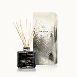 Thymes Noir Woods diffuser with packaging on a white background