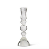 Clear glass candle holder on a white background