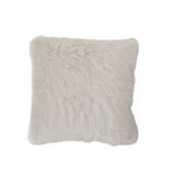 Fluffy white pillow on a light gray background