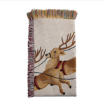 Woven blanket with  reindeer design on a white background