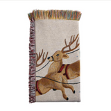 Woven blanket with  reindeer design on a white background