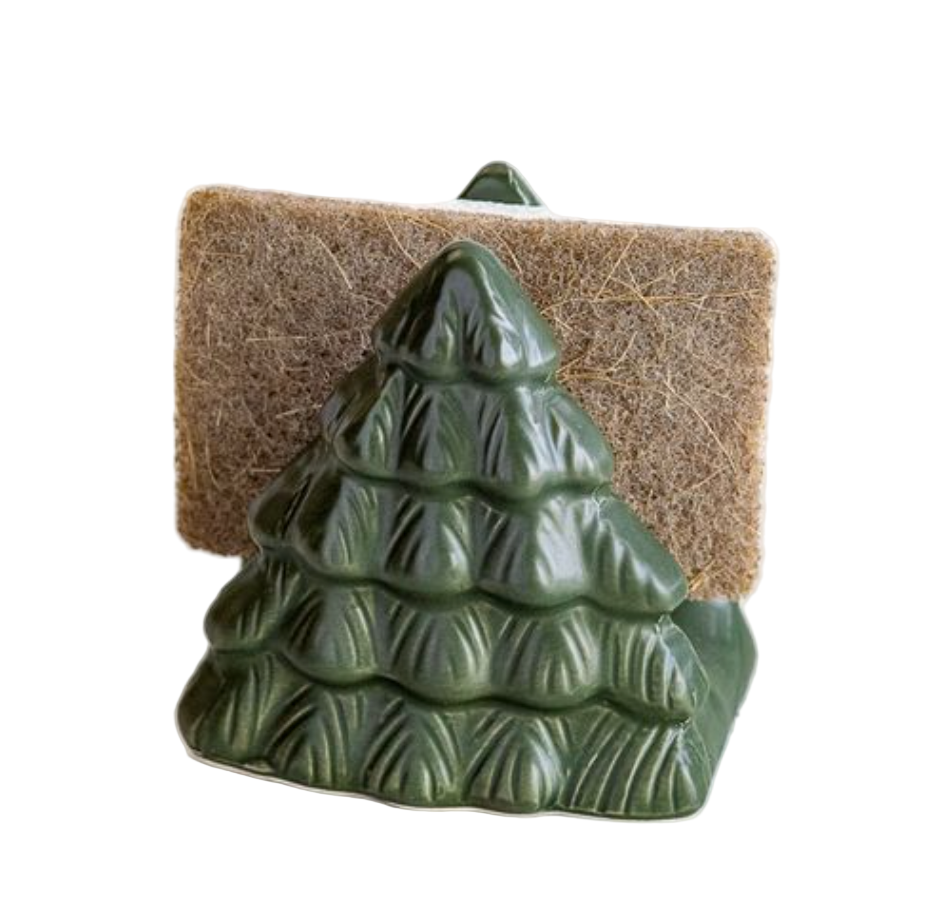Green ceramic tree-shaped soap holder with a brown sponge on a white background