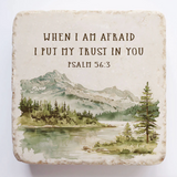 Decorative stone with a mountain landscape and Bible verse 'When I am afraid I put my trust in you Psalm 56:3' on a white background.