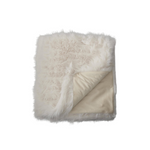 White fluffy blanket with a beige interior on a white background
