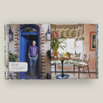 Photobook cover with images of a man, a door, and a living room.