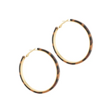 Patterned Leopard Leather Hoops on white background