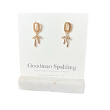olished gold square stud with a delicate bow design that drops