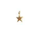 Polished five-point star charm with 18K triple gold plating, designed for adding to a necklace or bracelet.