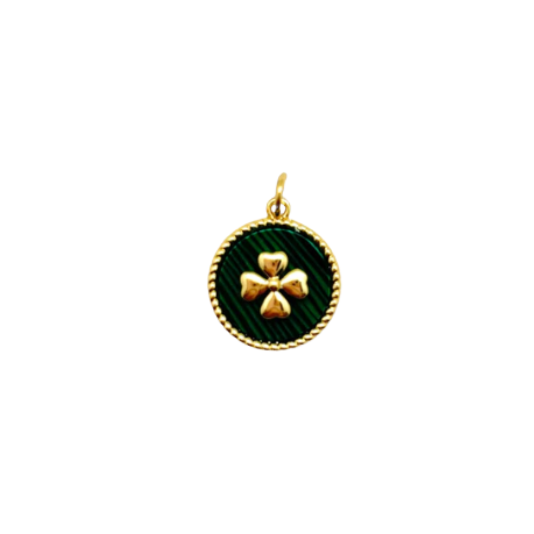 Round charm with green malachite-style background and gold-tone four-leaf clover, framed by a twisted gold border.