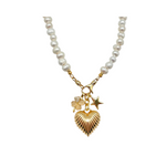 Pearl necklace with gold charms on a white background