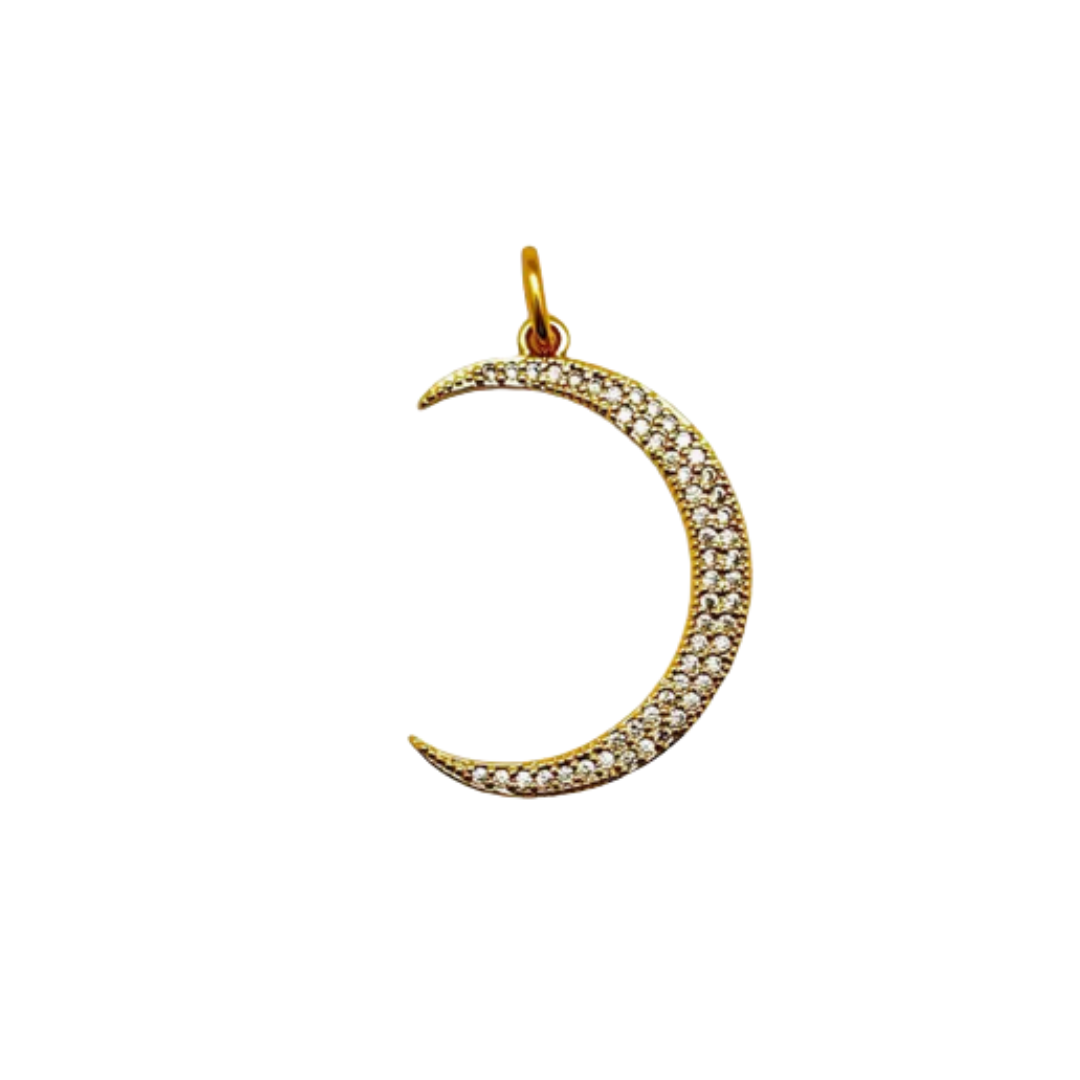 Gold crescent moon pendant with embedded stones on a white background
